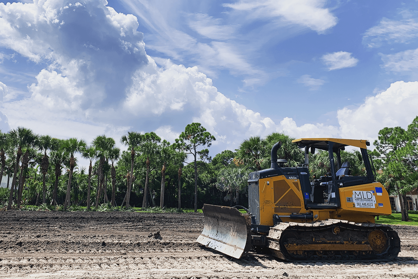 Bulldozer grading dirt